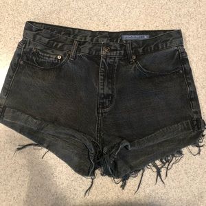 “Denim Colab” Boyfriend style, black denim shorts.